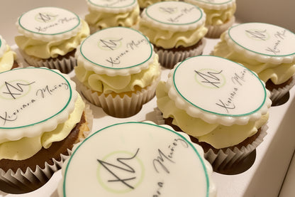 Cupcakes with personalized labels on a white plate