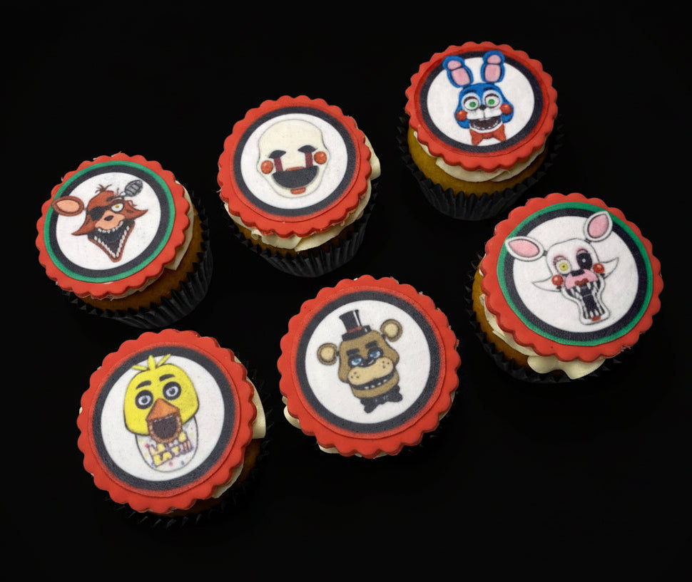 Cupcakes with five nights at Freddy's character faces 