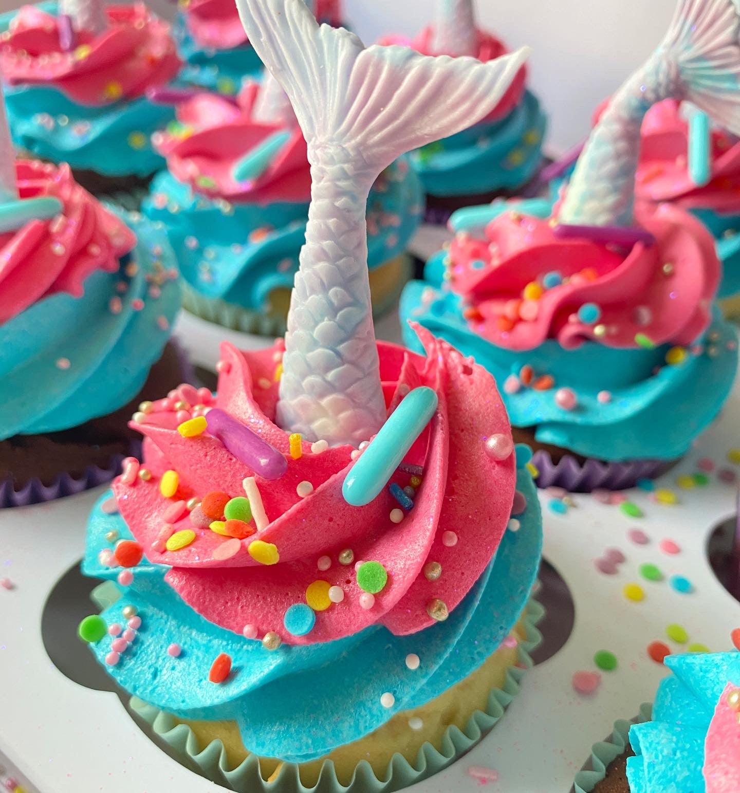 Colorful cupcakes with mermaid tails