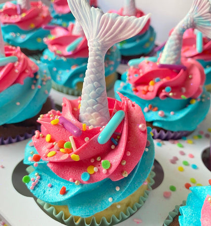 Colorful cupcakes with mermaid tails