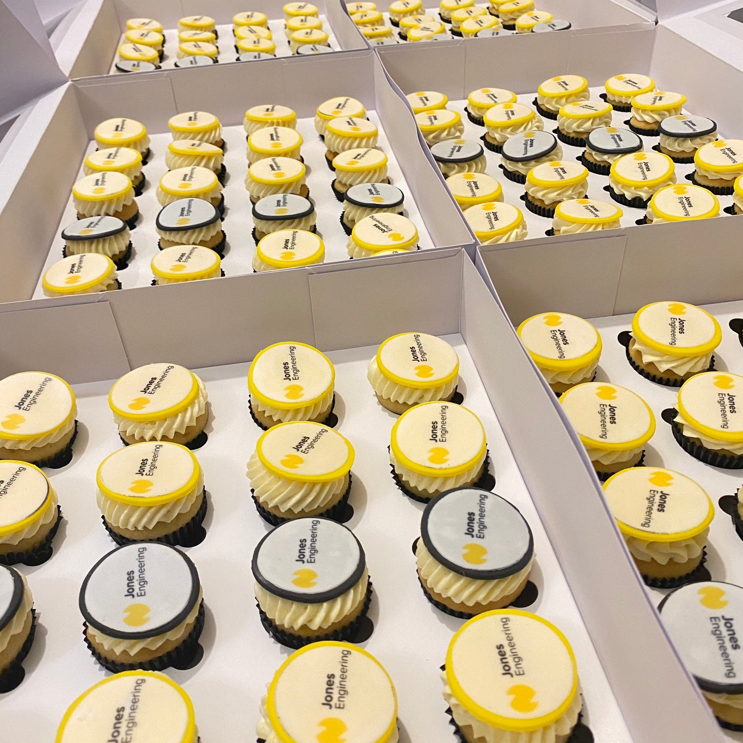 Mini cupcakes with 'Jones Engineering' branding.