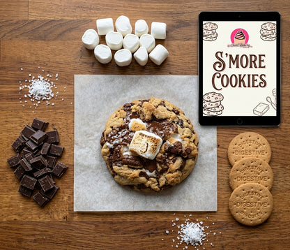 S’more cookie with toasted marshmallow and chocolate beside the Sweet Bakery Dublin digital recipe displayed on a tablet.